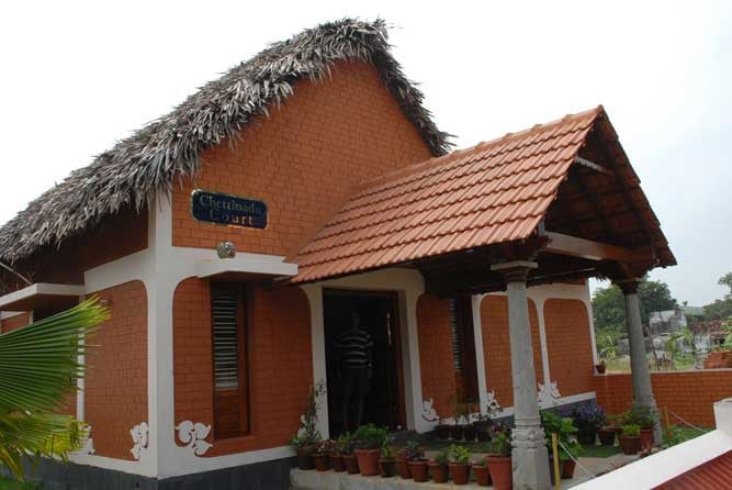 Private room in a village resort at Chettinadu