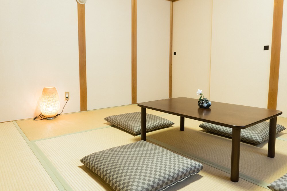 Hidden tatami room near forest and lake.