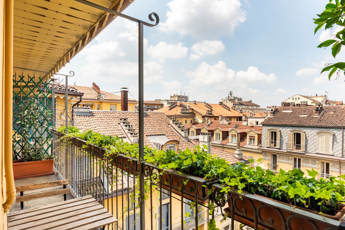 City centre attic with balcony and mountains view