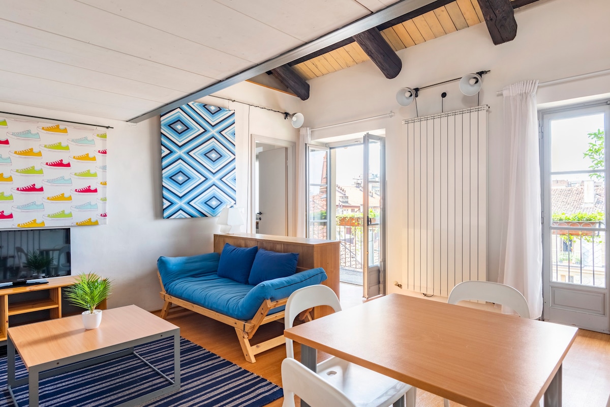 City centre attic with balcony and mountains view