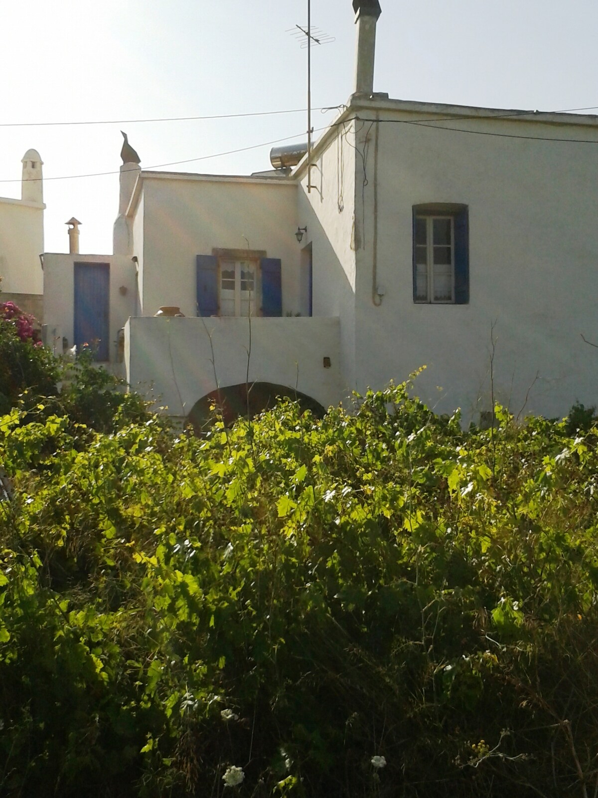 Traditional home built of stone with vaulted area.