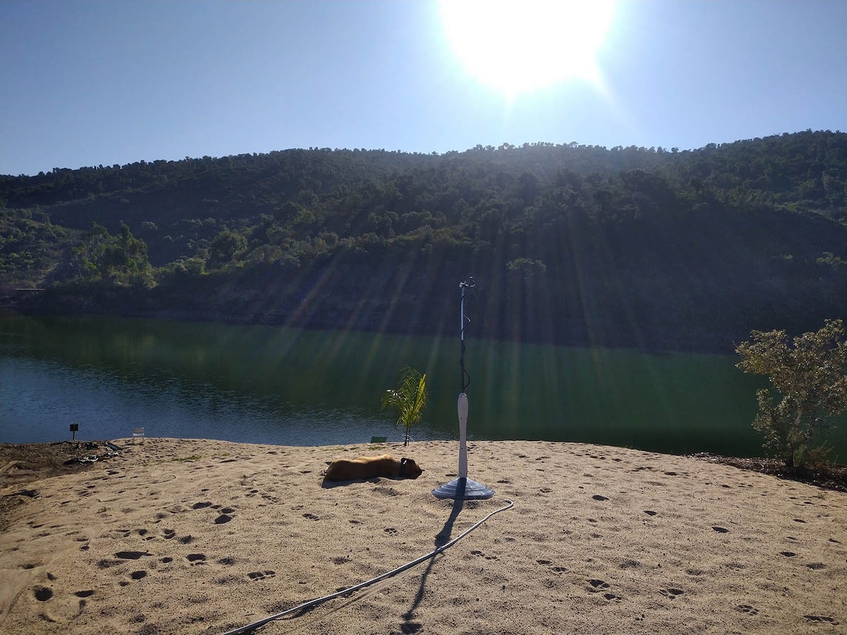 Wooden house on the lake with beach & opt rent car