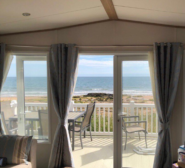 Beach front luxury caravan with stunning views