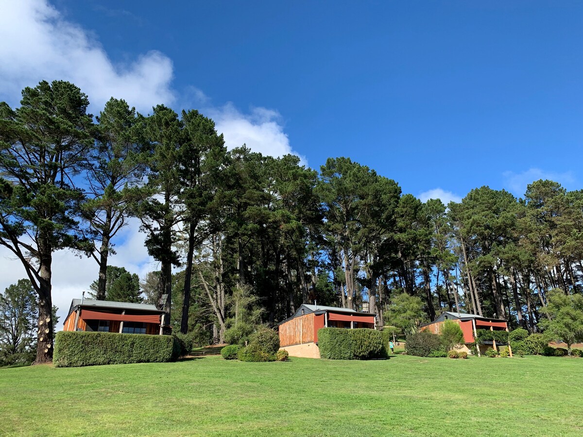 Seclusions - Redgum log cabins