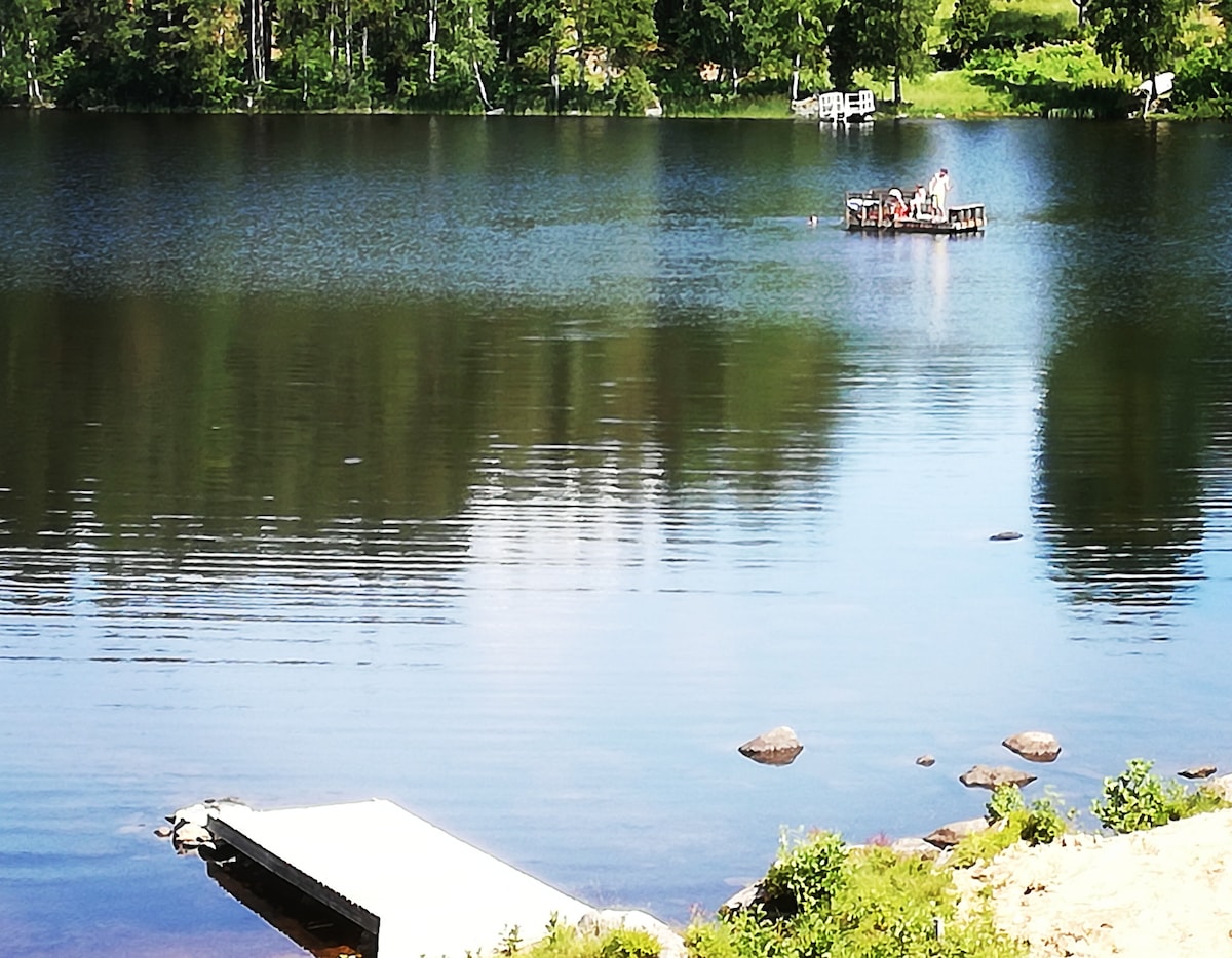 A house, a lake and a raft