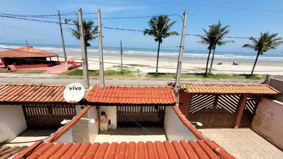 Pé na areia casa frente praia