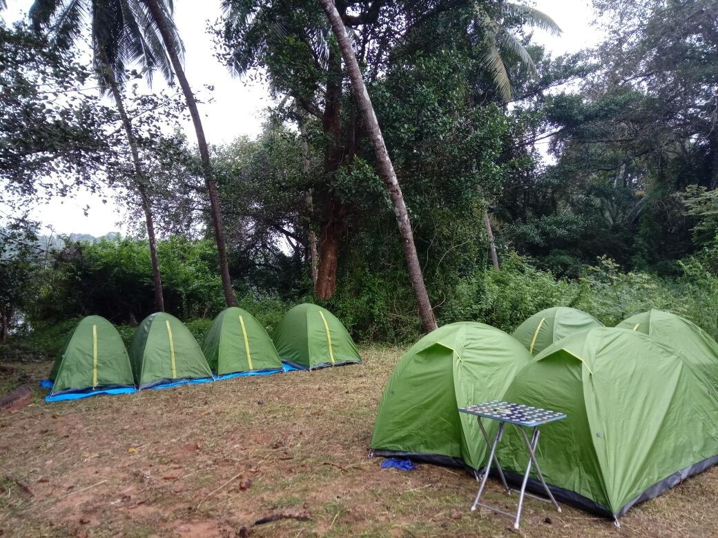 KayakBoy: Camp Next To River Bank