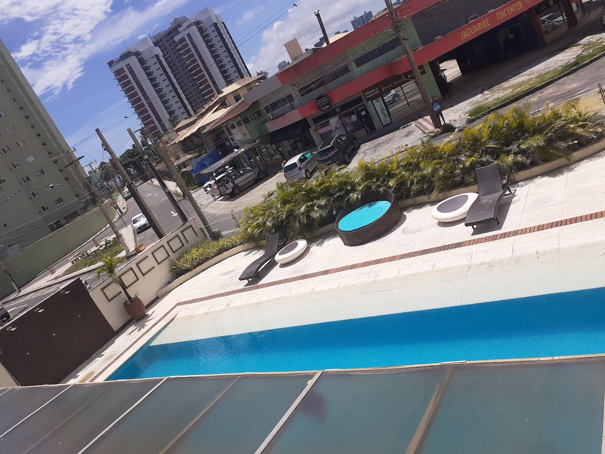 Flat encantador com piscina a um passo da praia