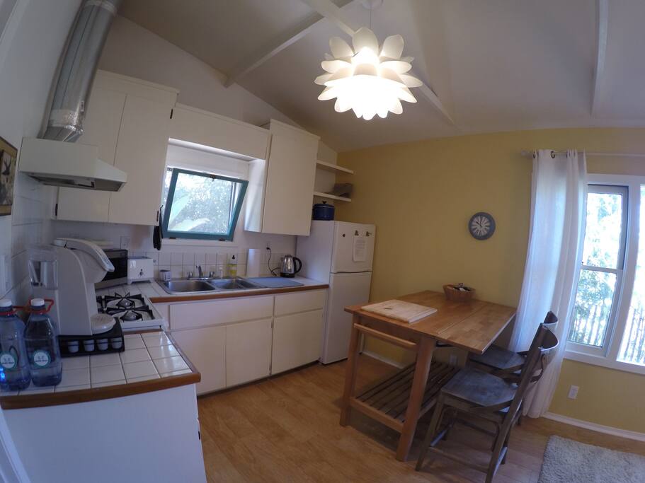 kitchen island is ideal for meals at home or as an office work