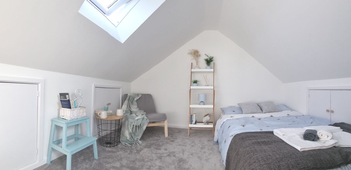 Cosy attic room 'in the clouds'
