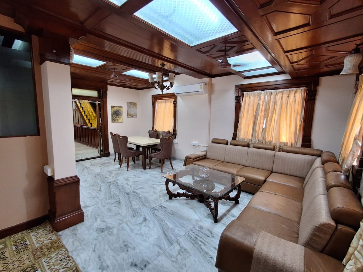 "Saffron" Luxurious Teak Wood Themed Penthouse