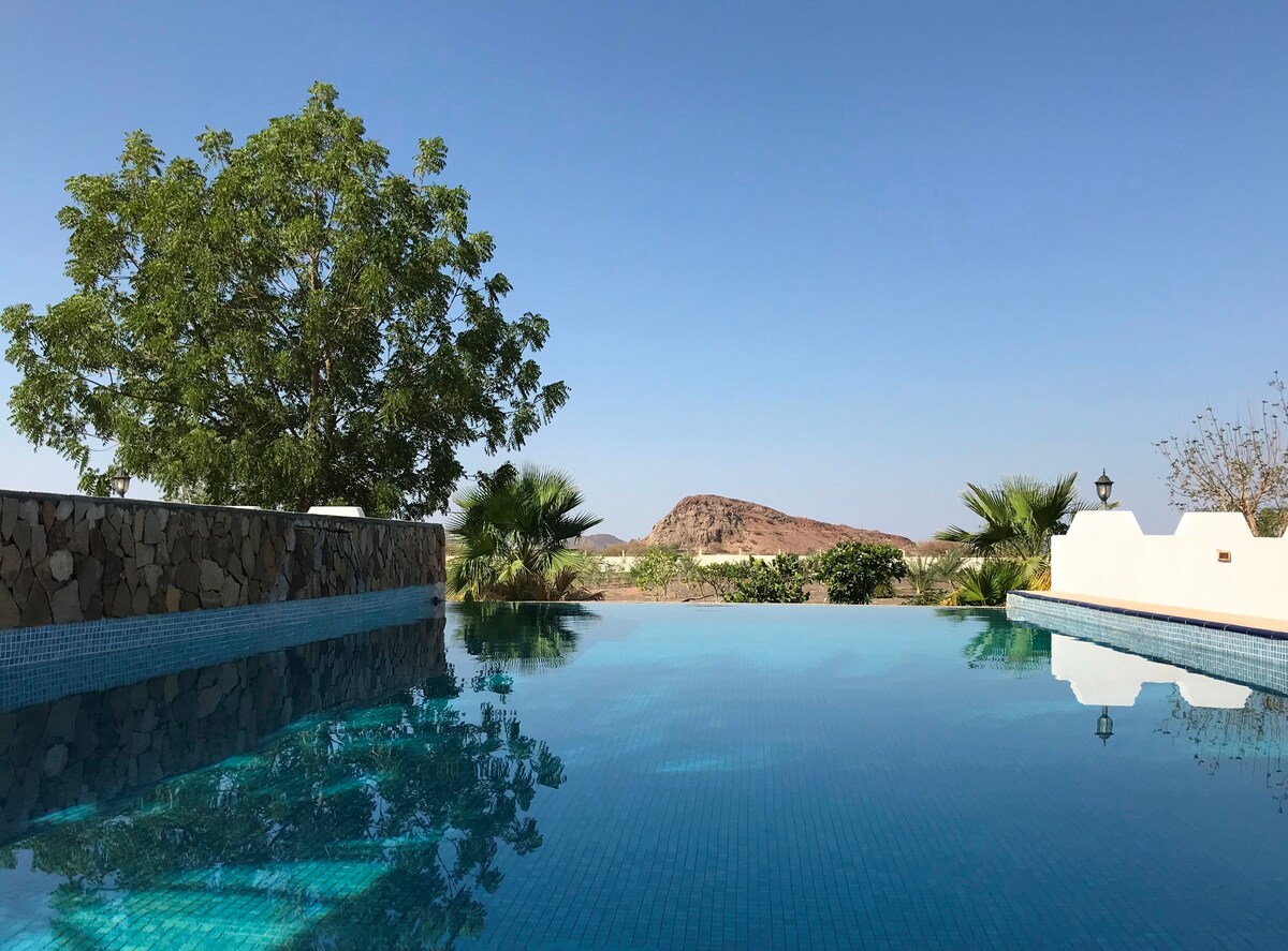 Deluxe cabin farmstay with pools in heart of Oman