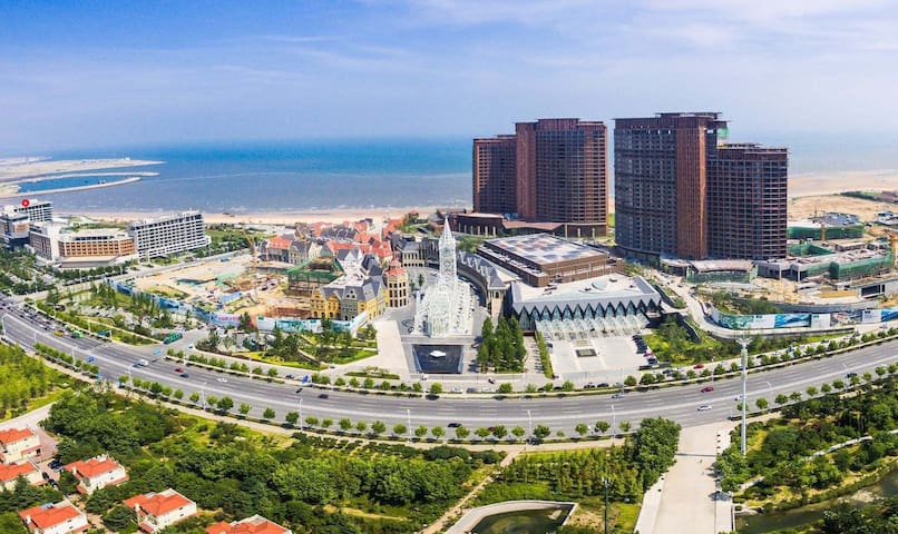 青岛黄岛胶南灵山湾达令港海景大床豪装,楼下即海滩,有观景阳台!