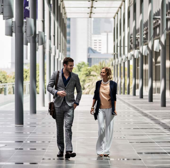 image of a man and a woman walking