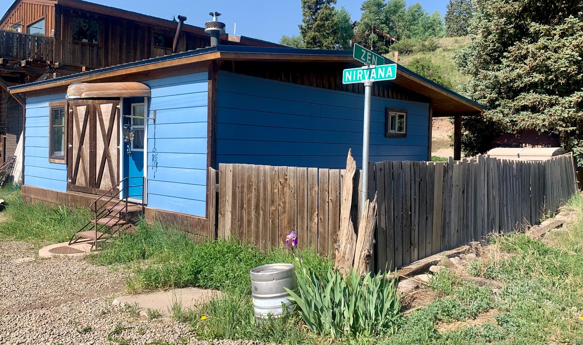 Blue Cottage on Corner of Zen & Nirvana