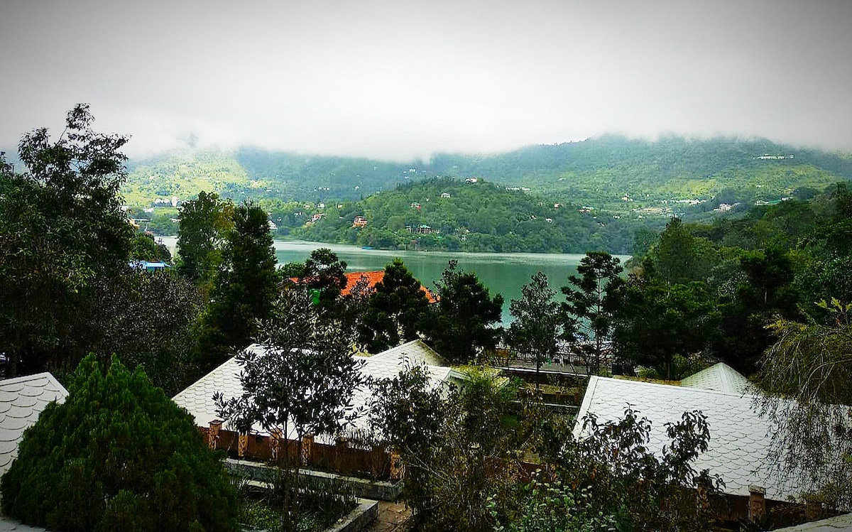 Cottages by the Naukuchiatal Lake