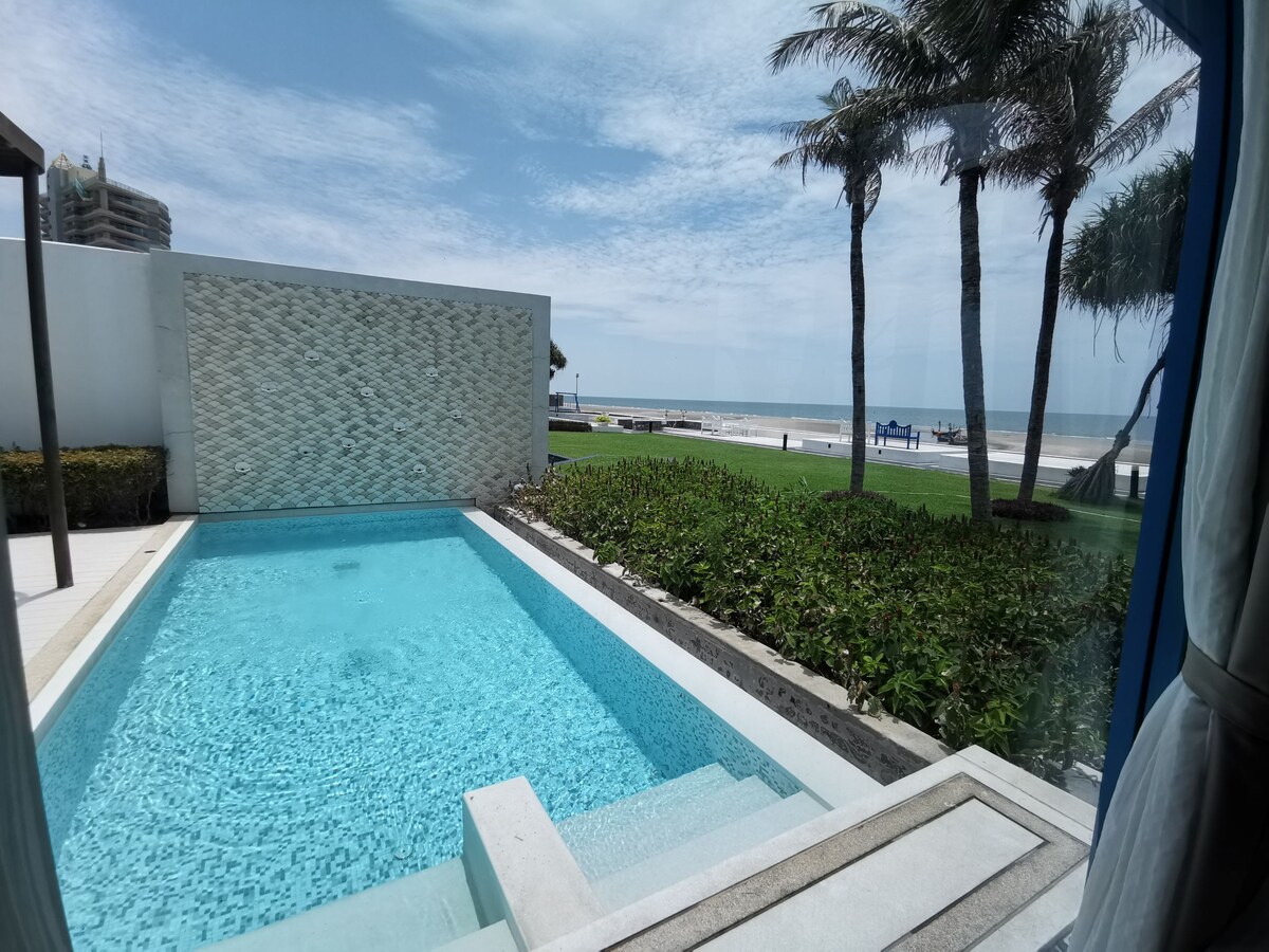 Beachfront​ luxury villa with​ a private pool.​