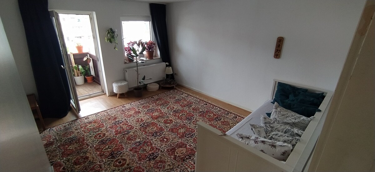 Light bedroom with balcony in center of Hildesheim