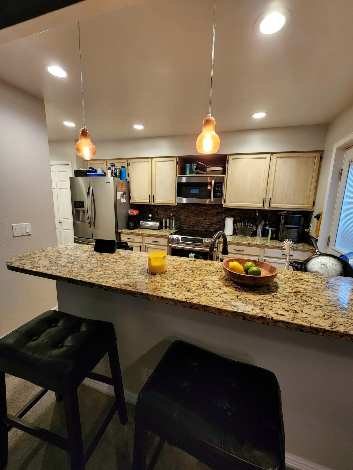 Private suite w/ full kitchen, game room & bar