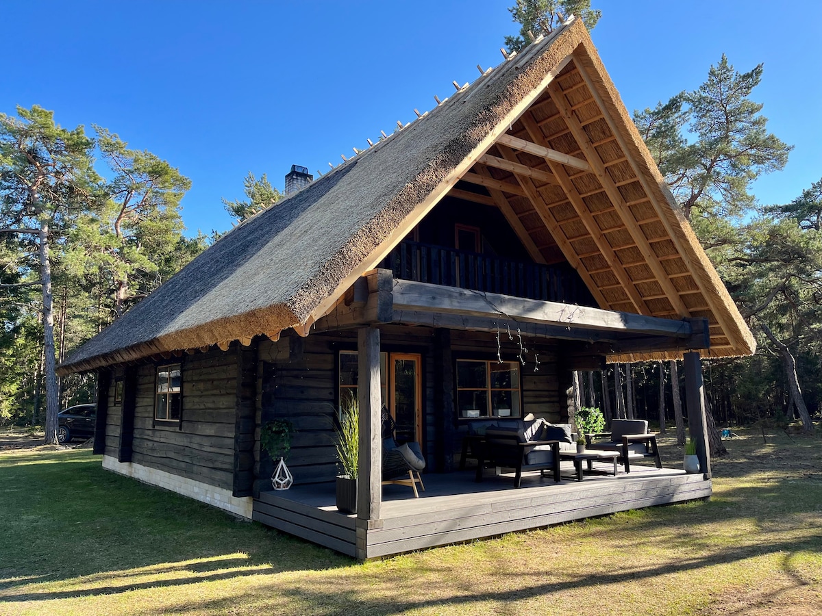 Holiday home with hot tub, lounge area and sauna