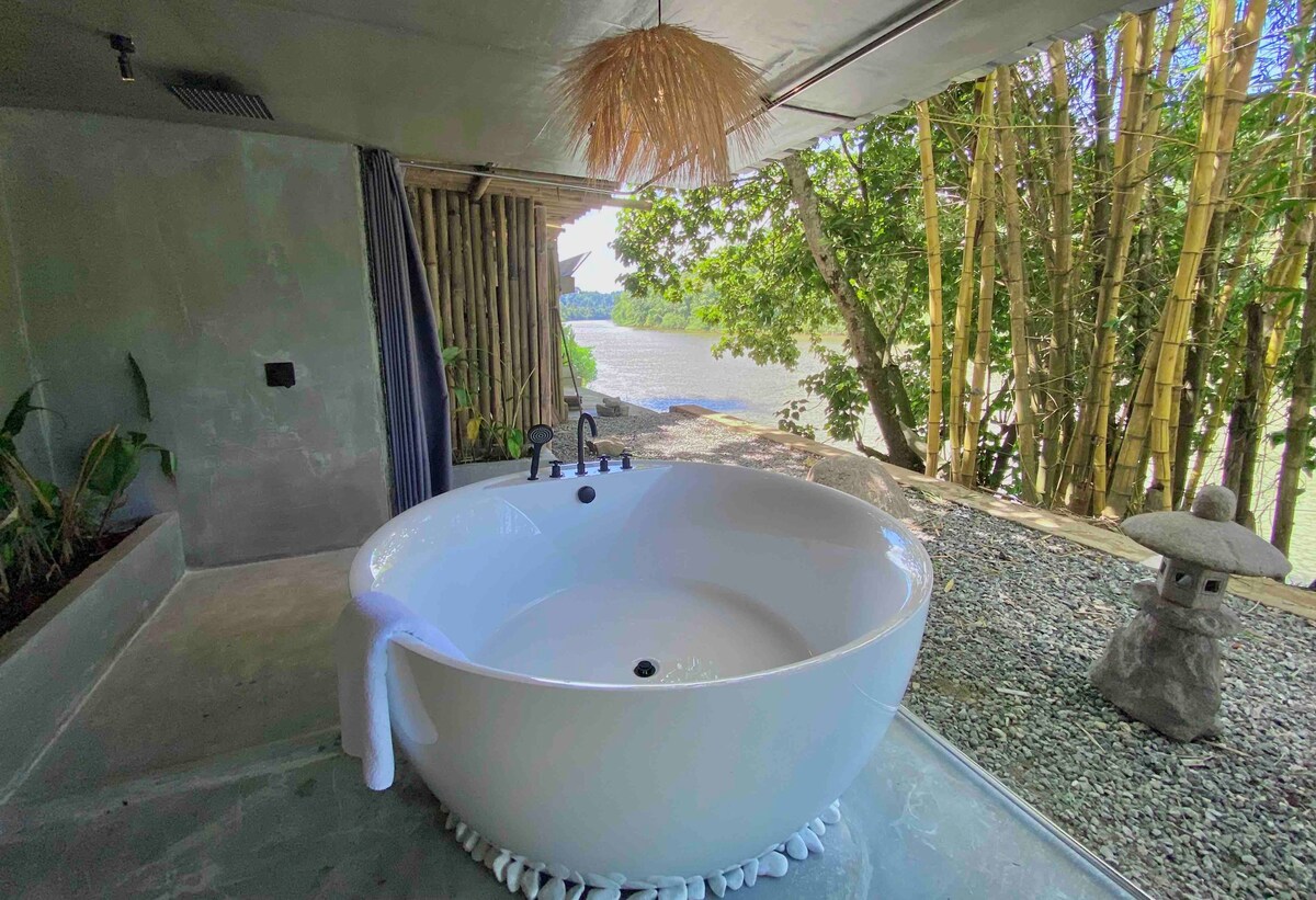 Riverside Wabi-Sabi Oasis: Zen Bathtub Bliss