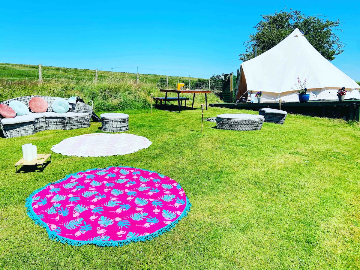 Luxury bell tent with hot tub