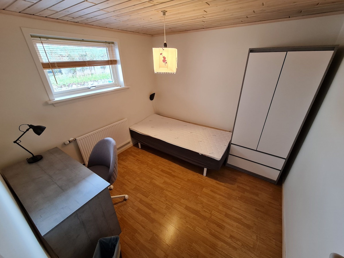 1-bedroom rental with shared amenities. (Room E)