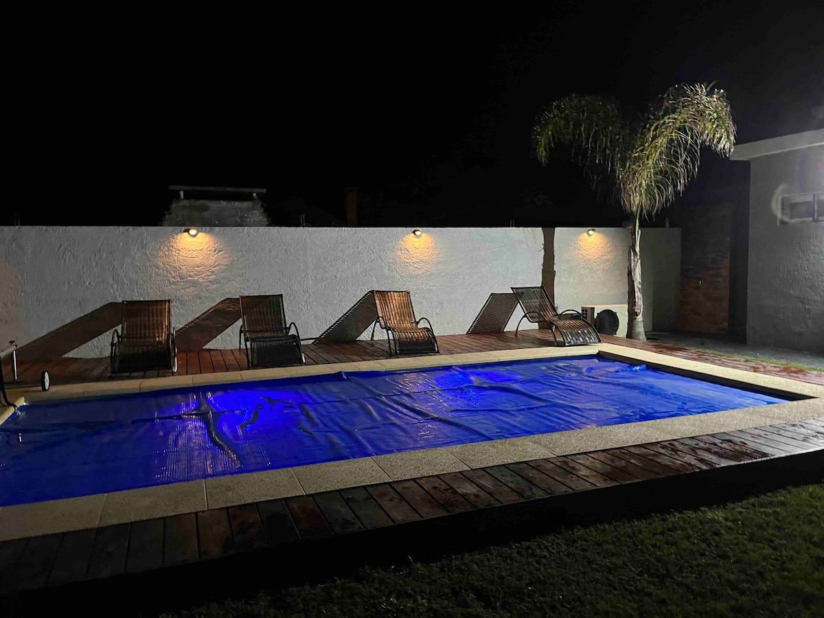 Casa con piscina climatizada