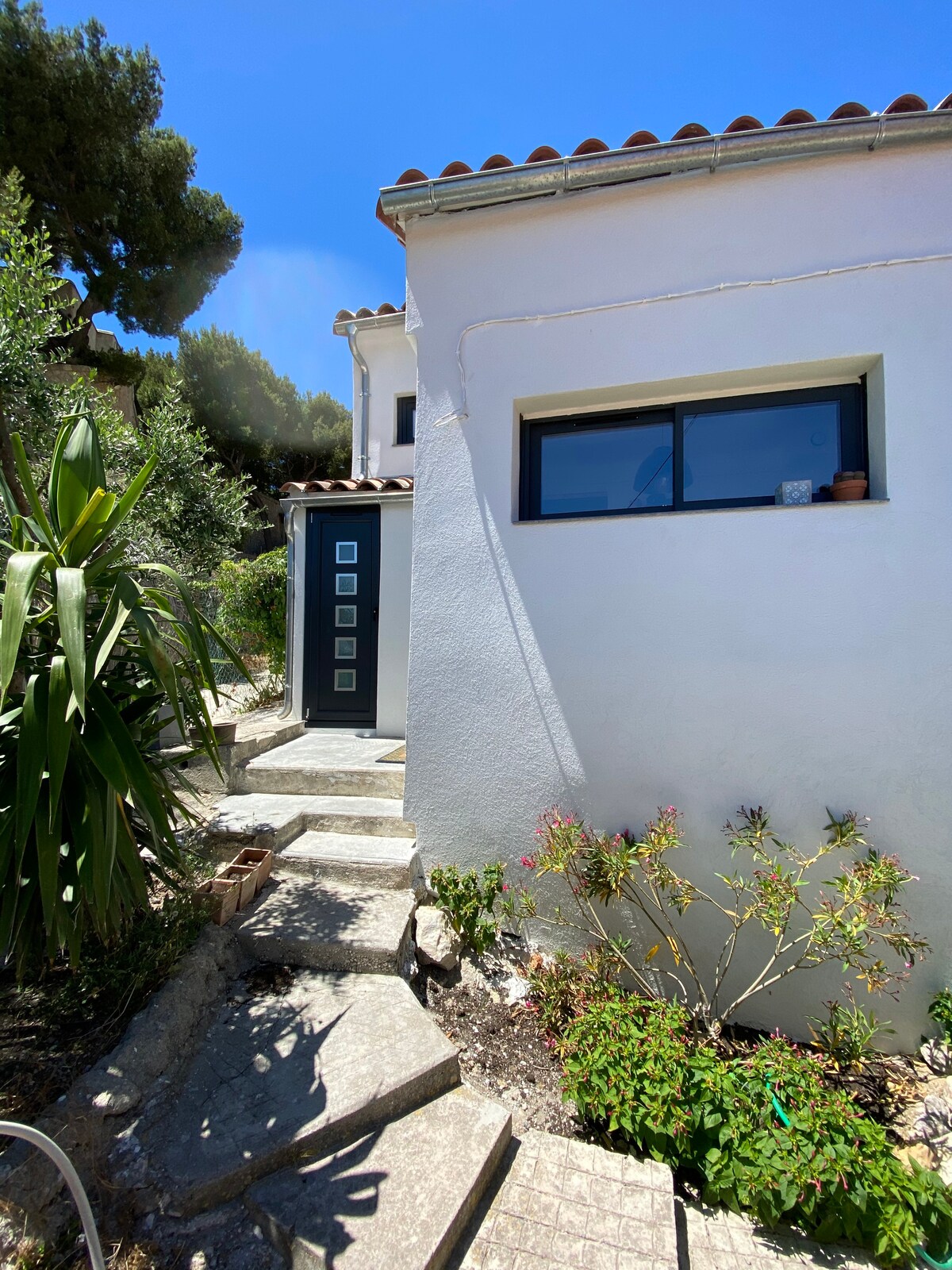 Maison les pieds dans l’eau vue mer