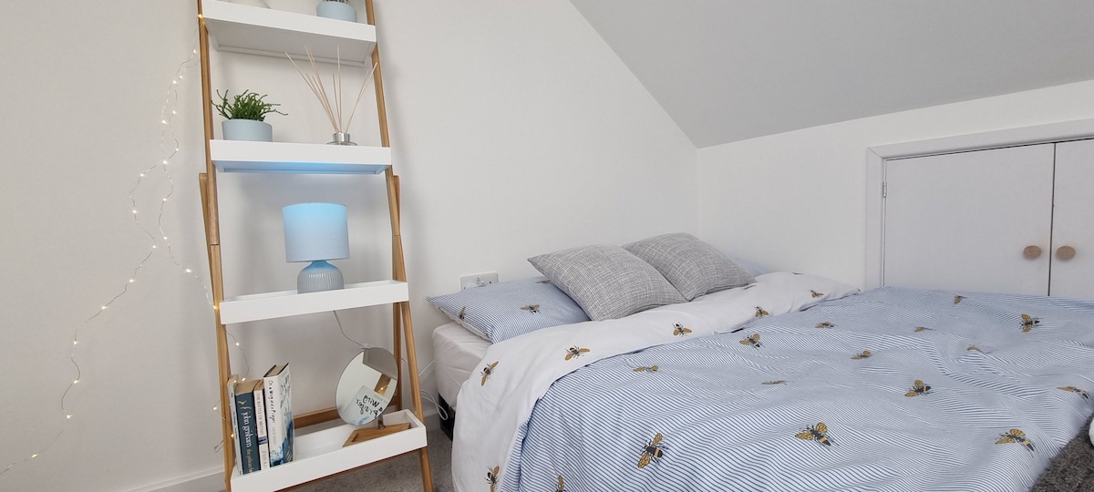 Cosy attic room 'in the clouds'