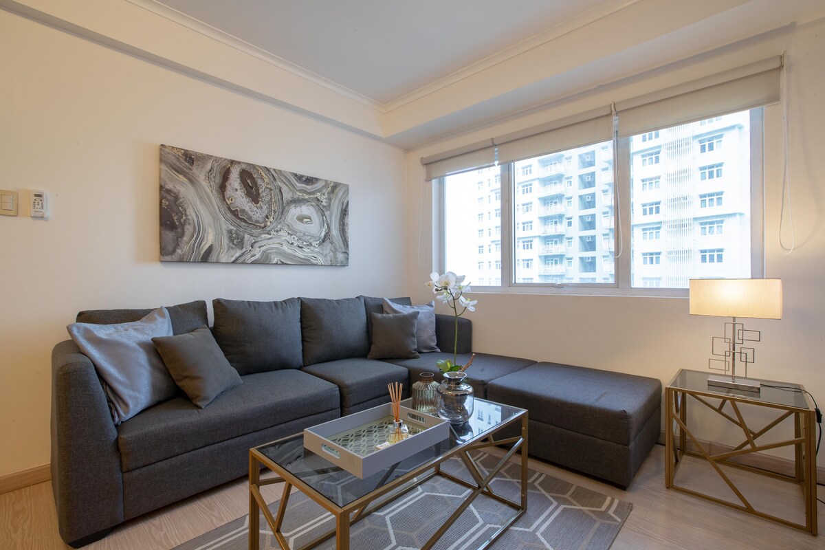 宽敞的BGC双卧室公寓，配备快速无线网络、Netflix和超高清电视