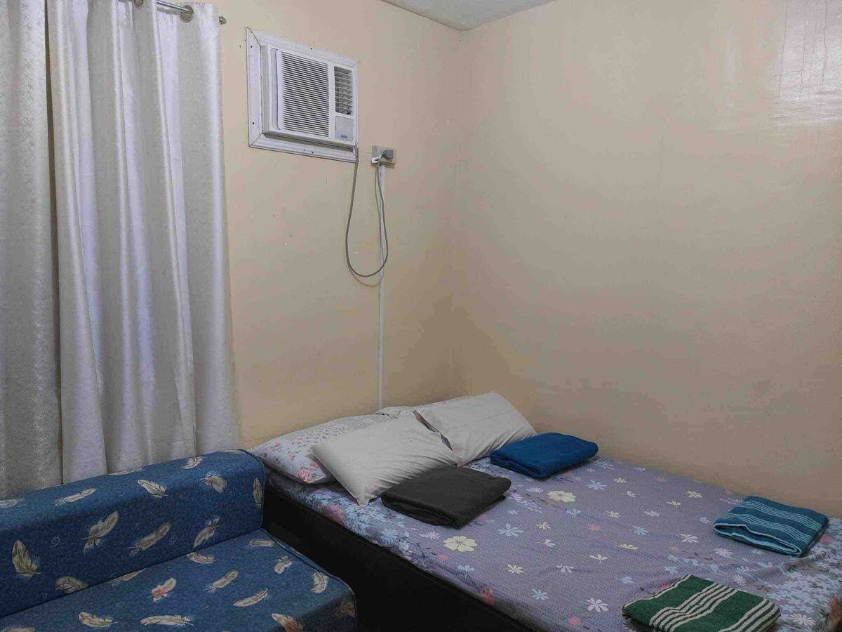 Two airconditioned bedroom home with free parking