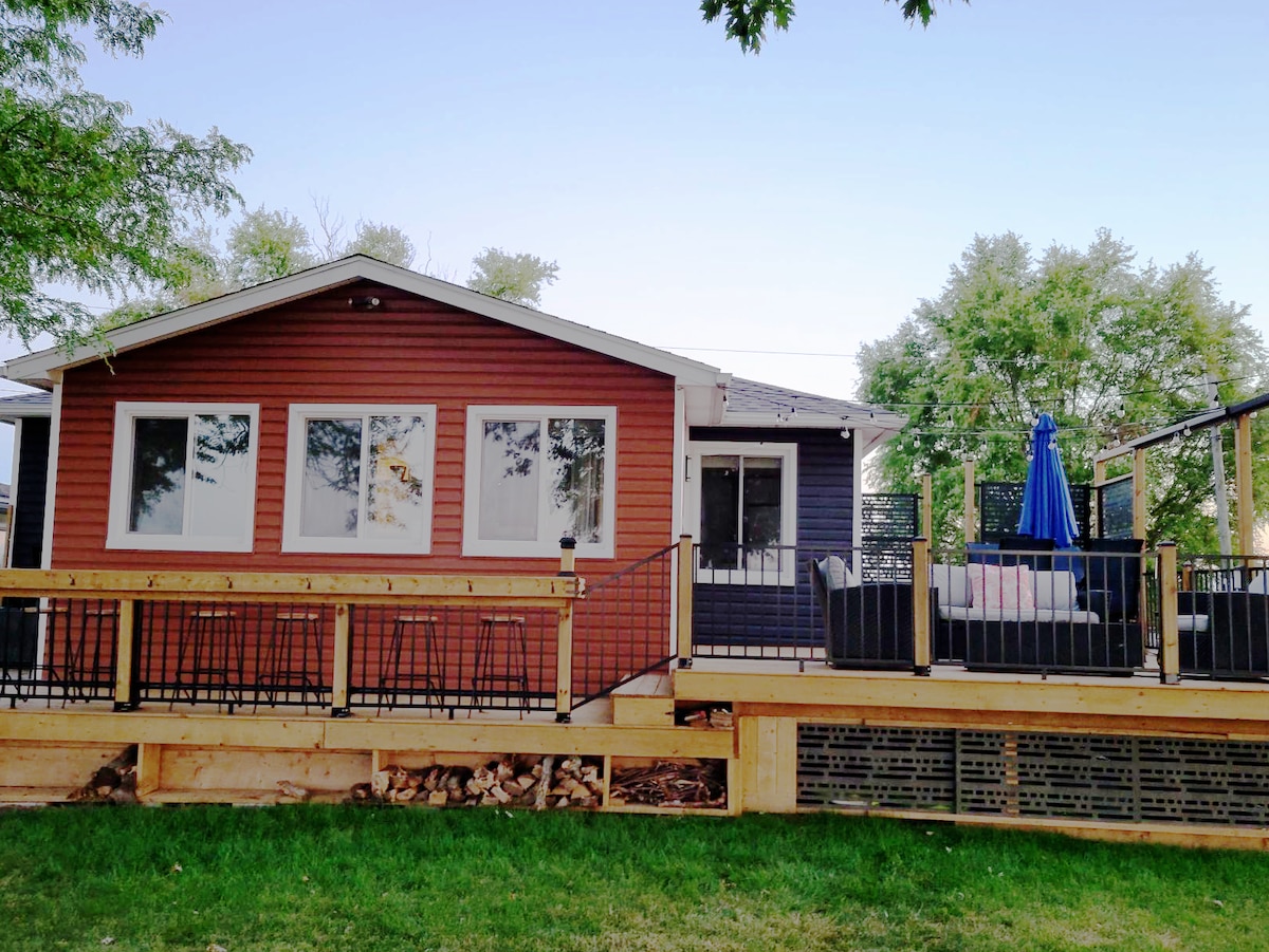 Charm & Style in this 2 bedroom lake front cottage