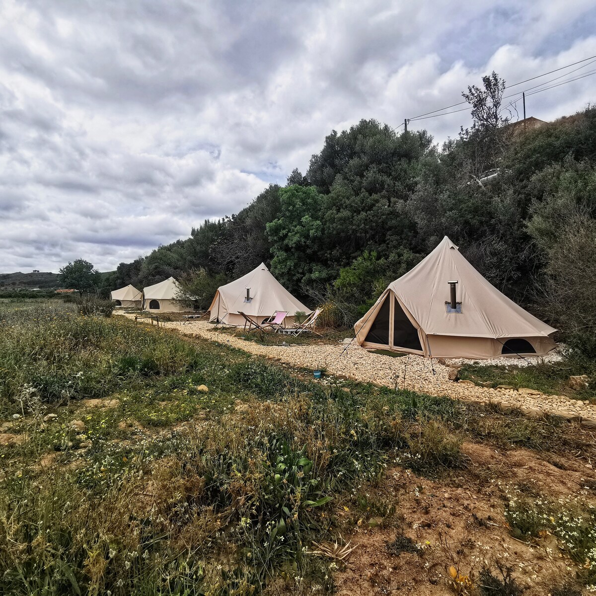 Family bell tent in nature