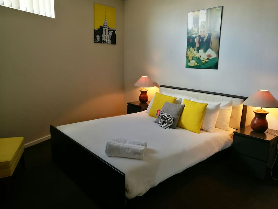 the master room features a super comfy queen bed, private en