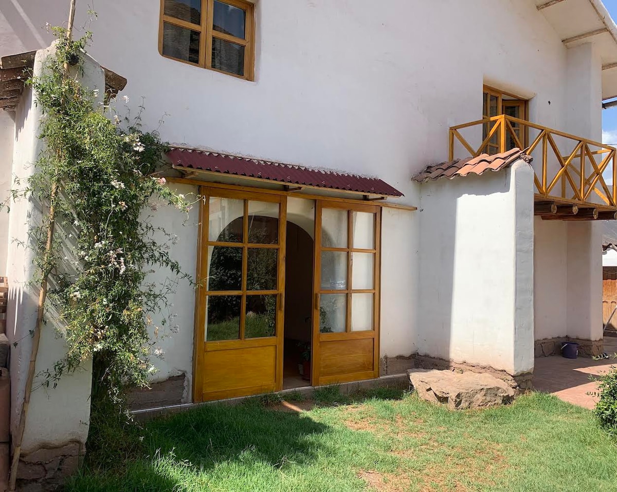 Adobe house by the fields