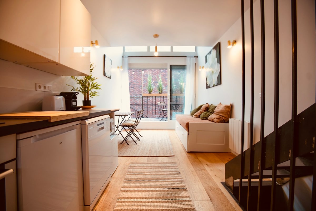 Maison de ville dans allée piétonne avec terrasse