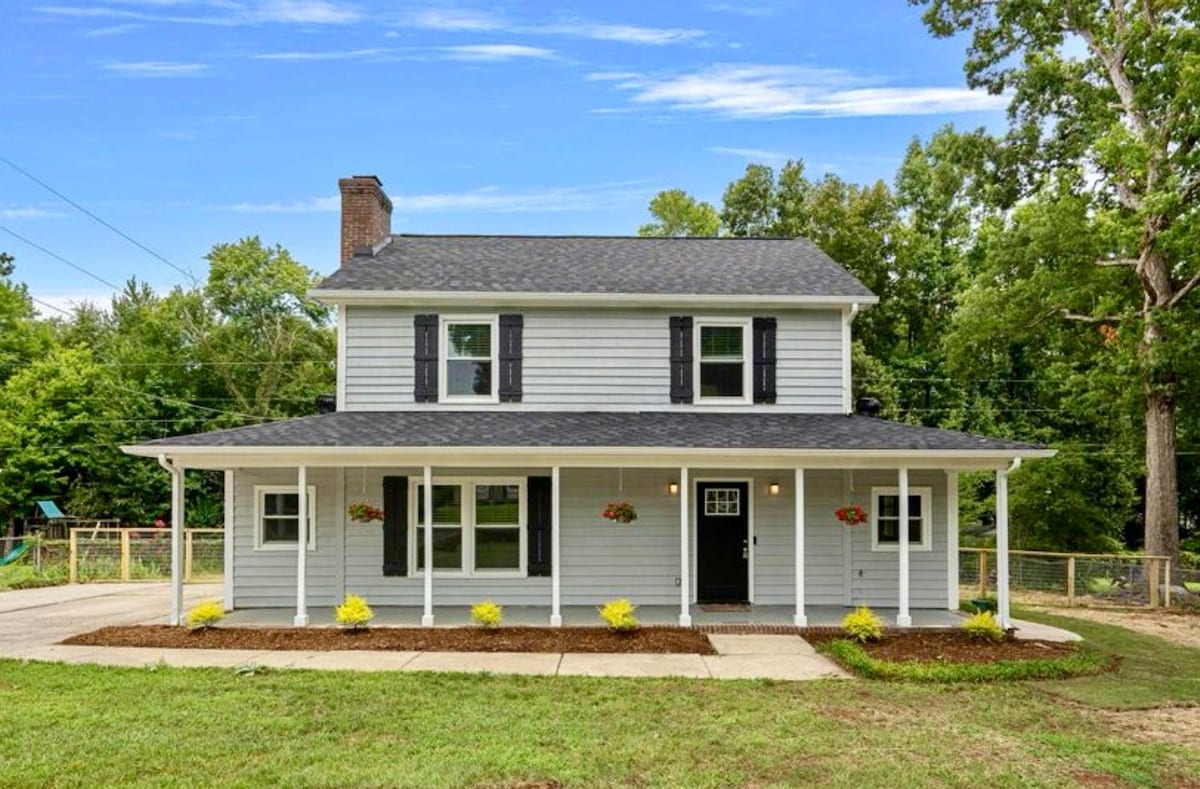 Red Lantern Farmhouse with Tesla Charger!