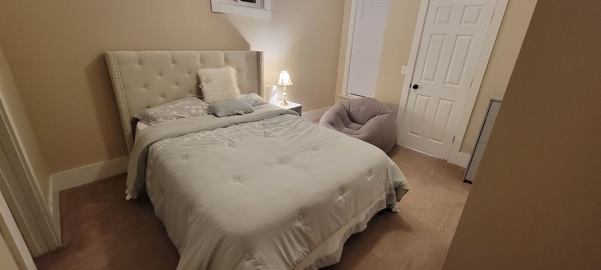 luxurious master bedroom with access to work desk
