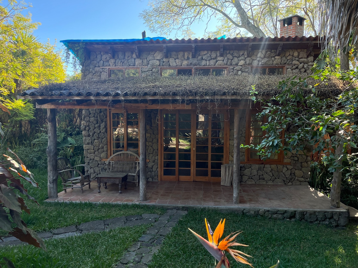 Guest house in tranquil garden with swimming pool