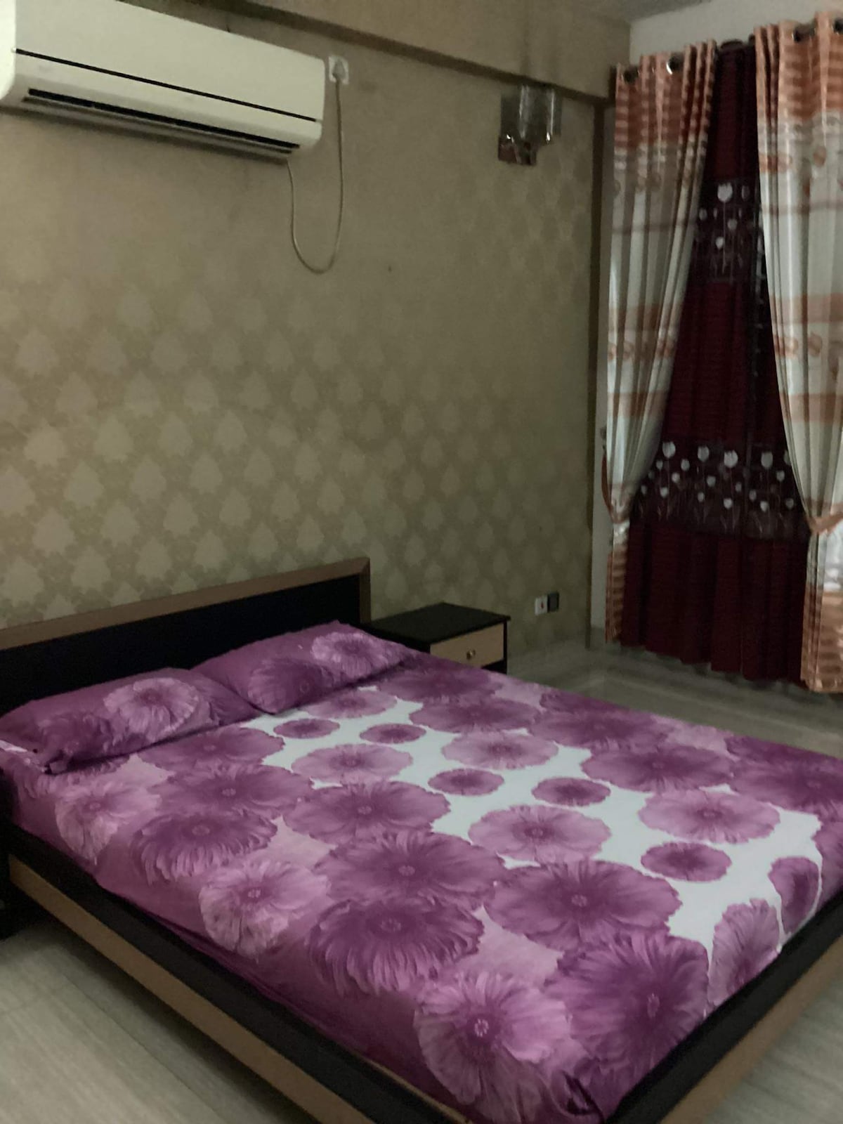 Room with balcony at a duplex house in Dhaka