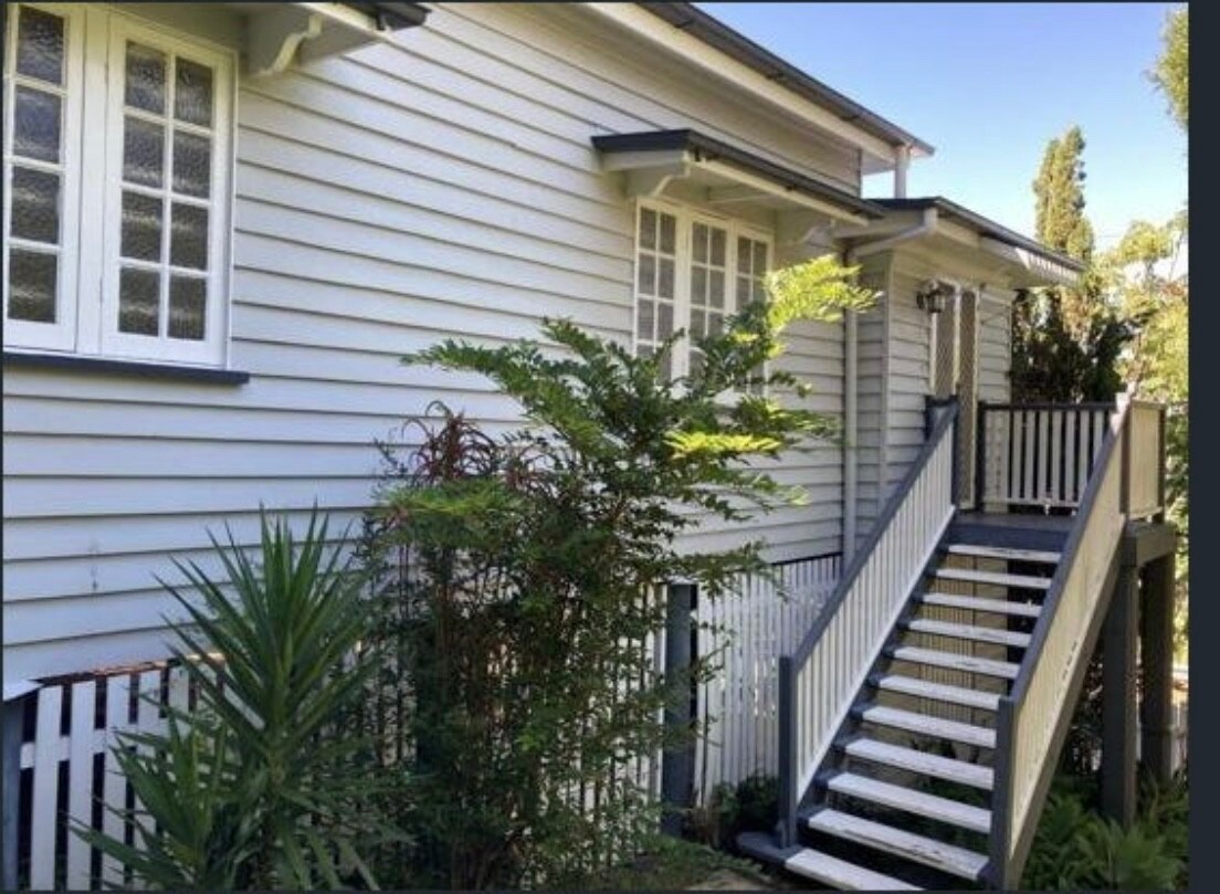 Classic large Queenslander house with garden