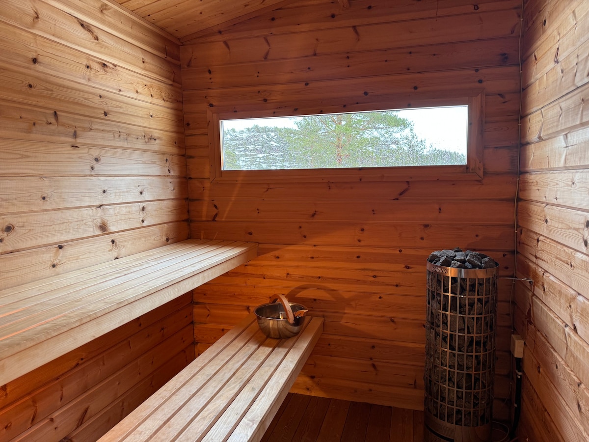 Cozy log cabin with heated spa, sauna & magic view