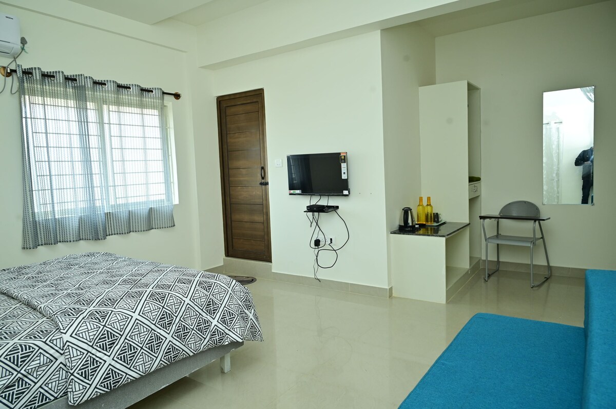 Spacious AC Room with Kitchenette And Balcony