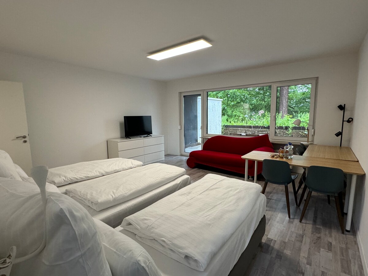 Kaffeehof 3 - 4张单人床，一个独立房间。
