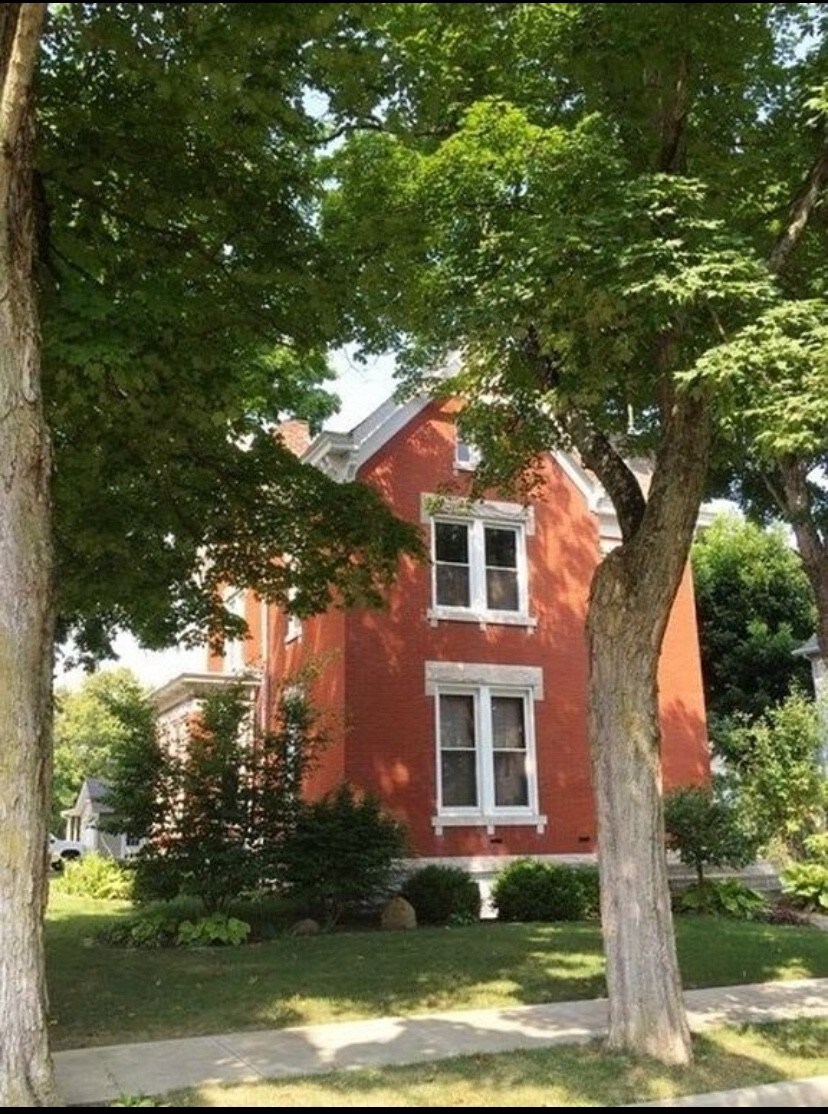 Historic 4br 3story brick with a pool and patio