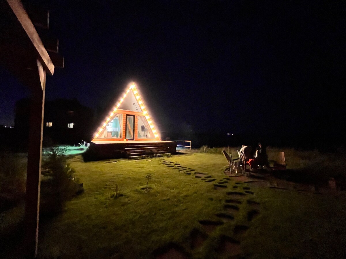 Cozy A-frame cabin in Karaganda.