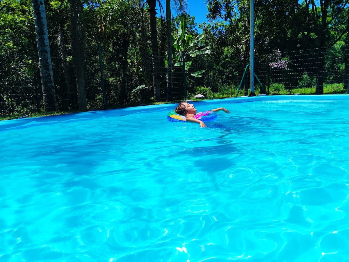 Casa com piscina e quiosque