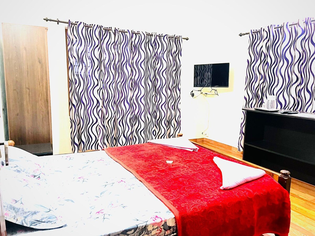 Budget room for family in wayanad with balcony