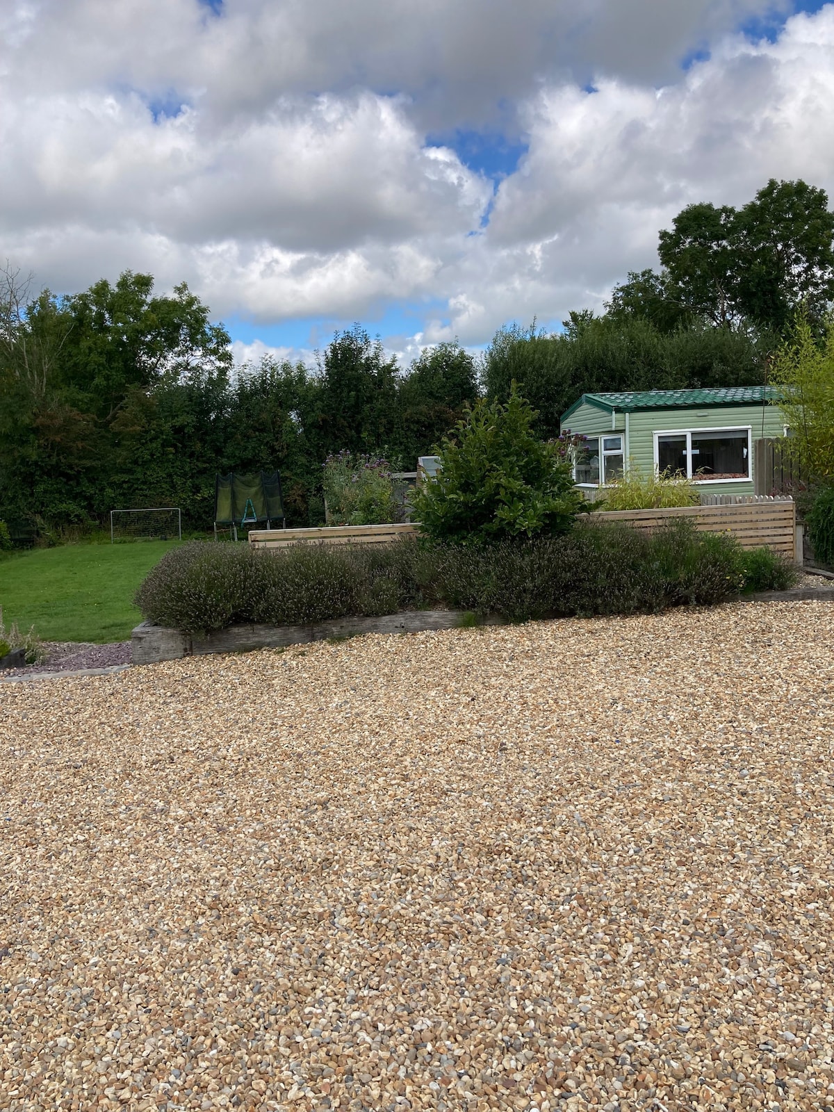 Mobile home in the countryside, along side family